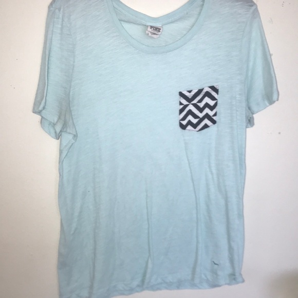A blue tee with a black and white striped pocket - Picture 1 of 4